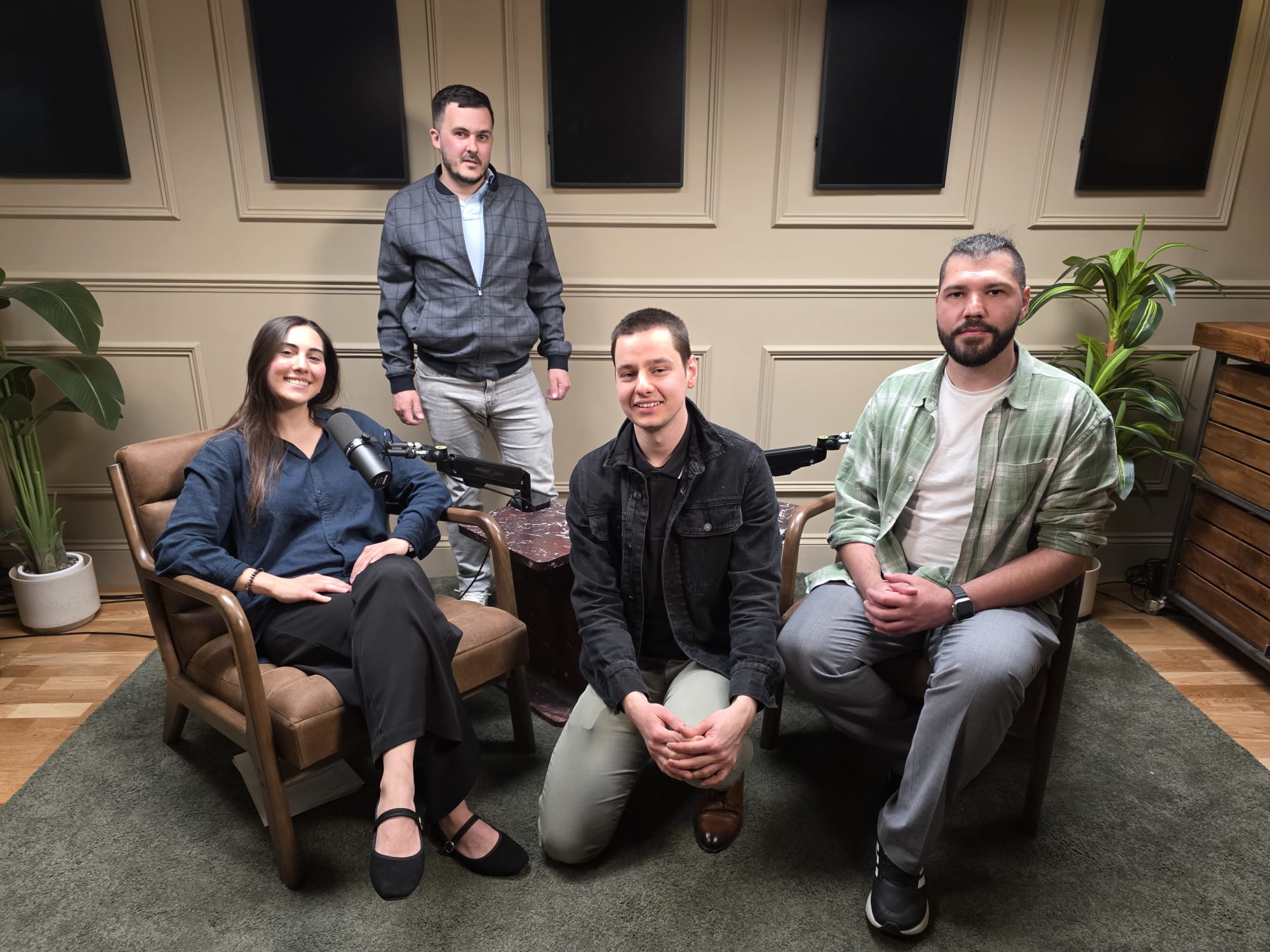 The LOYALS team seated together on the couch set in the London studio